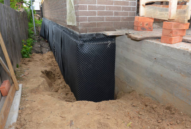 SJ Waterproofing Pros technician performing targeted Emergency Waterproofing assessment in Elizabethtown, PA